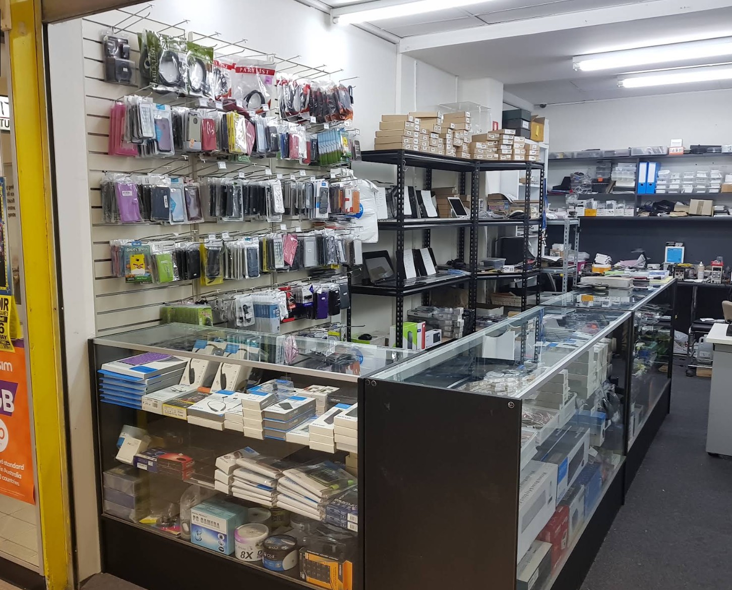 Shop counter with laptops ready for collection
